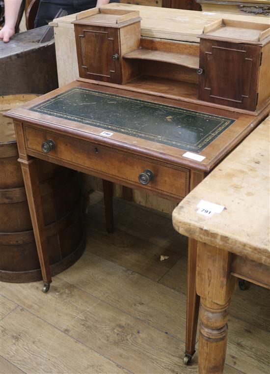 An Edwardian mahogany writing table, W.69cm